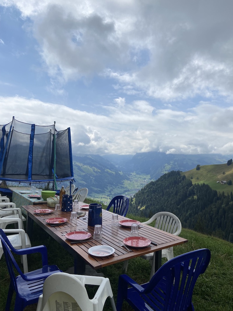 lunch table overlooking valley during PLUS program trip