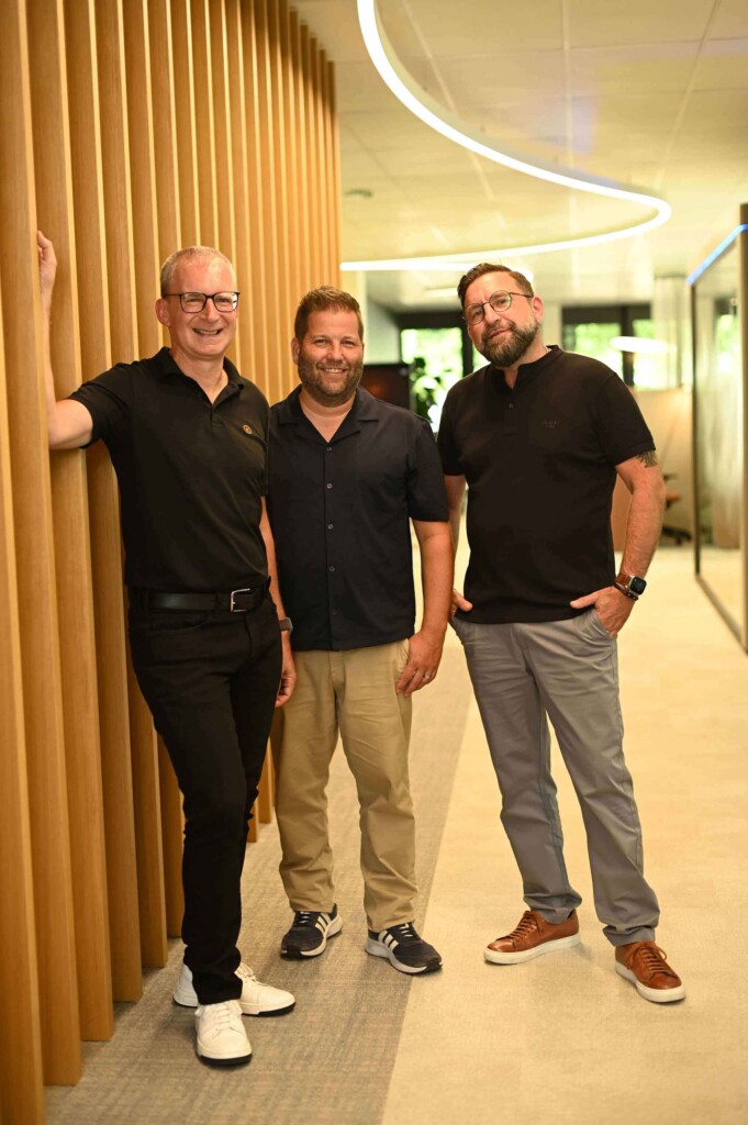 Matthias, Bruno, and Tom standing together