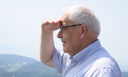 Dani Suter looking out over a valley in Switzerland
